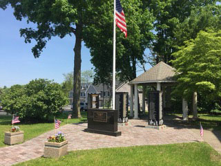 Memorial Park, pathway and towers, american flag