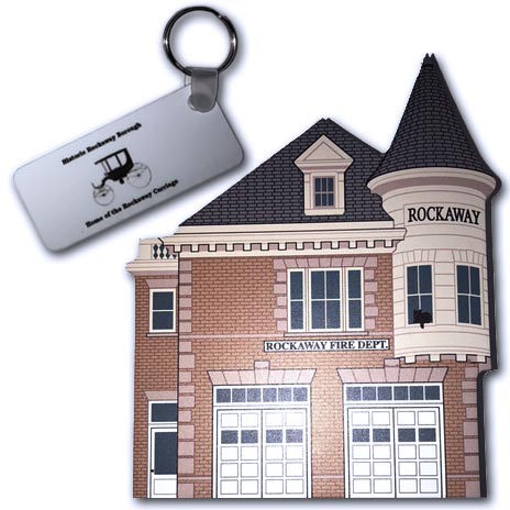 key chains and a mantel-type do-dad of the municipal firehouse